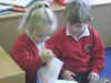 Girl and boy reading